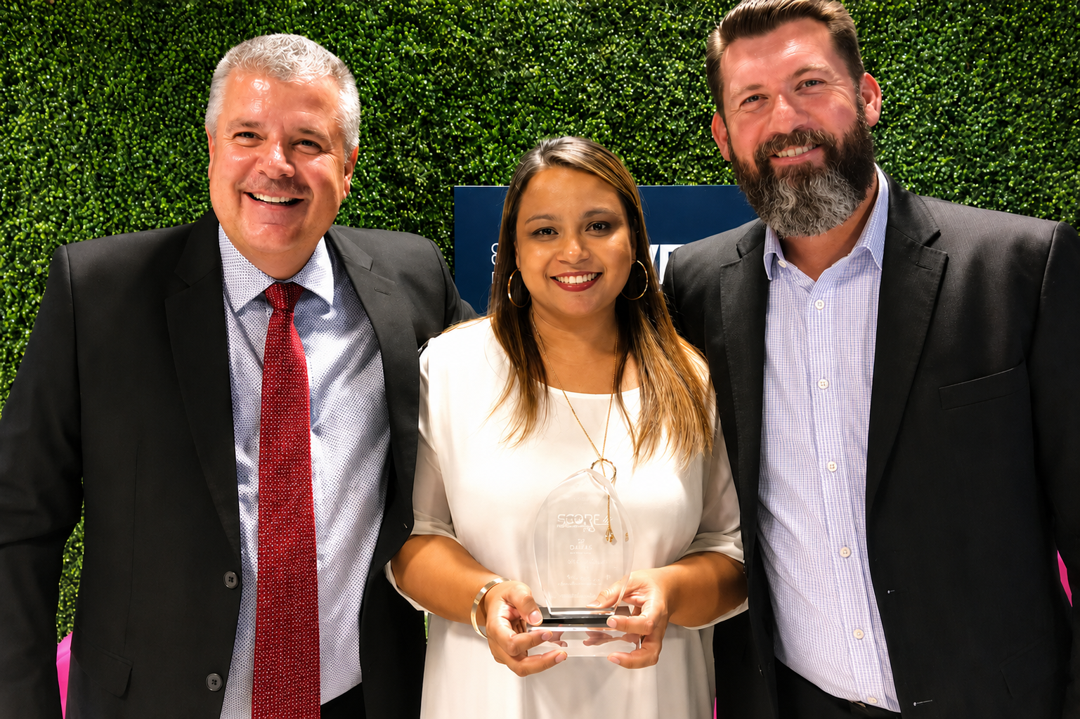 Stef Fourie, Rahana Vally and Devon Rimmington, Brilliant Link directors, accepting a Sage award